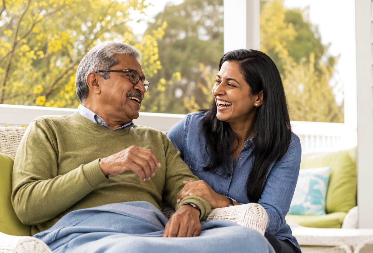 A client relaxing at home with a family member